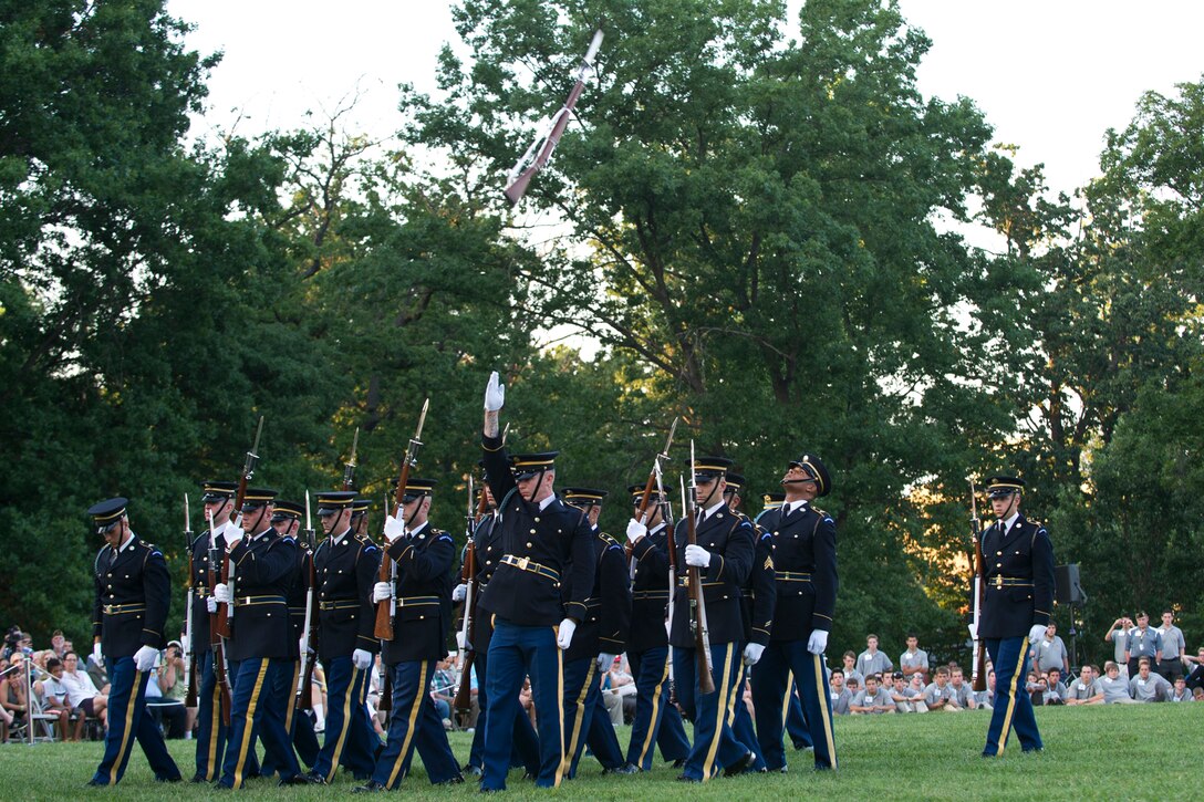 Soldiers assigned to the 3rd U.S. Infantry Regiment, also known as "The Old Guard," perform during the Twilight Tattoo to mark the 60th Anniversary of the Korean War on Joint Base Myer-Henderson Hall, Va., July 24, 2013.