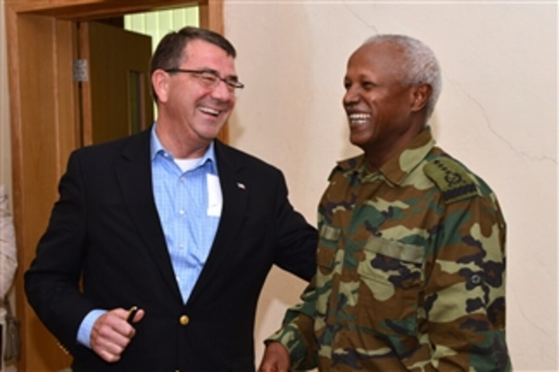 Deputy Secretary of Defense Ashton B. Carter, left, meets with Gen. Samora Yunis at the Ethiopian National Defense Force Headquarters in Addis Ababa, Ethiopia, on July 24, 2013.  Carter is visiting Ethiopia to meet with senior government and military leaders to affirm the growing security partnership between the United States and the East African nation.  