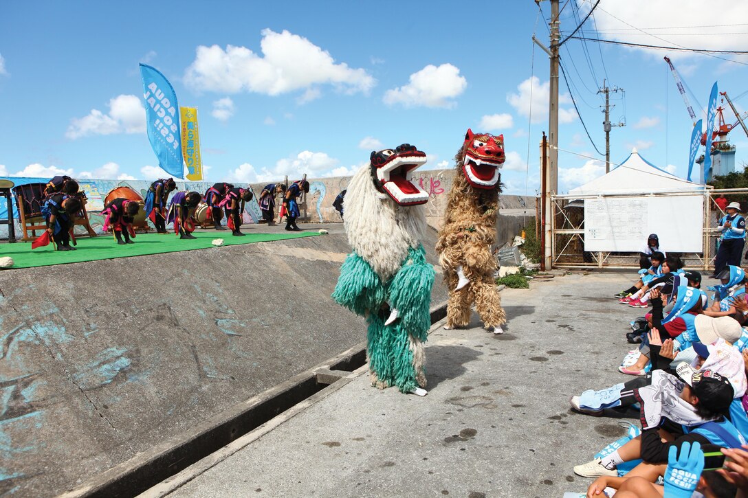 Dancers perform the Shishi Mai, or lion dance, July 15 during the opening ceremony of the Aqua Social Fes 2013 "Vitamin Sea,"  The dance was adopted from the Chinese culture during the period of the Ryukyu Kingdom.