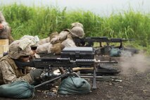 Marines fire M240 medium machine guns down range July 18 at Combined Arms Training Center Camp Fuji, Japan, during the biannual Fuji Warrior training exercise. The machine guns were strategically placed to train Marines how to employ the weapons systems effectively as fire support for other Marines conducting squad attacks. The Marines are with Combat Logistics Regiment 37, 3rd Marine Logistics Group, III Marine Expeditionary Force.