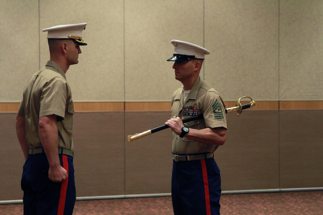 Sgt. Maj. Adam H. Yakubsin assumes duties as the Marine Corps Recruiting Station Detroit's sergeant major, July 19.
