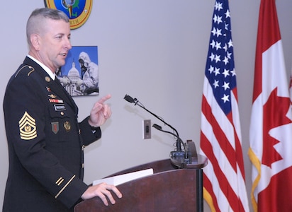 Command Sgt. Maj. Robert Winzenried speaks to members of NORAD and USNORTHCOM during his assumption of responsibility ceremony at NORAD and USNORTHCOM headquarters at Peterson Air Force Base, Colo., Sept. 15. Winzenried succeeds Chief Master. Sgt. Allen Usry, who retired from the Air Force during the same ceremony after 29 years of service.


