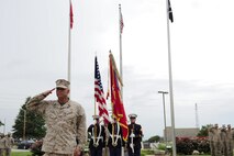 Sgt. Maj. Wayne A. Hertz, outgoing 9th Marine Corps District Sergeant Major, salutes during his retirement ceremony in Kansas City, Mo., July 26. Hertz served 27 years in the Marine Corps. 
