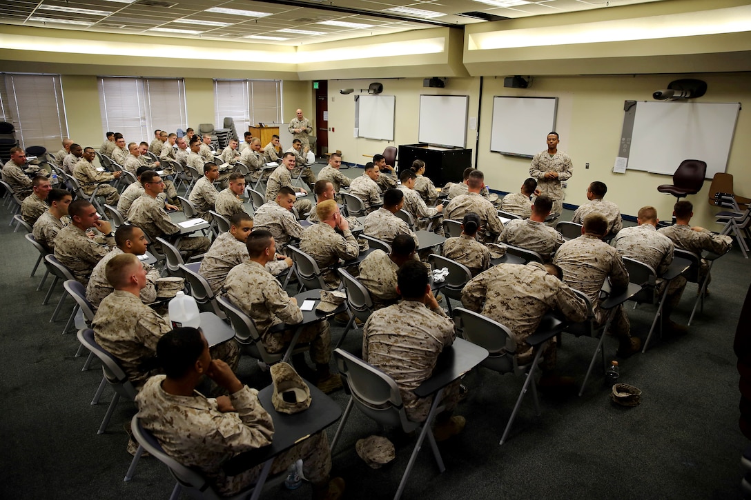 Marines gain experience leading their peers by giving presentations in a classroom environment during the Lance Corporal Seminar held at the Marine Corps Air Station here July 25. The Lance Corporal Seminar is a three-day course that the air station started this year to provide junior Marines with the knowledge and skills to progress in their military careers.