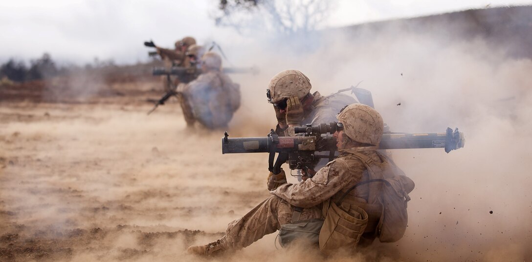Arlington, Va., native 2nd Lt. James Warlick, second platoon commander, Golf Company, 2nd Battalion, 3rd Marine Regiment leads his Marines through a series of trenches during a live-fire platoon attack at the Infantry Platoon Battle Course, Range 10 at Pohakuloa Training Area, Hawaii, July 20, 2013. “This attack is a confirmation of individual and squad level skills,” Warlick said. The attack was part of Exercise Lava Viper, a battalion-level combined-arms exercise designed to enhance the abilities of ground combat and support element Marines participating. (U.S. Marine Corps photo by Cpl. Matthew Callahan)