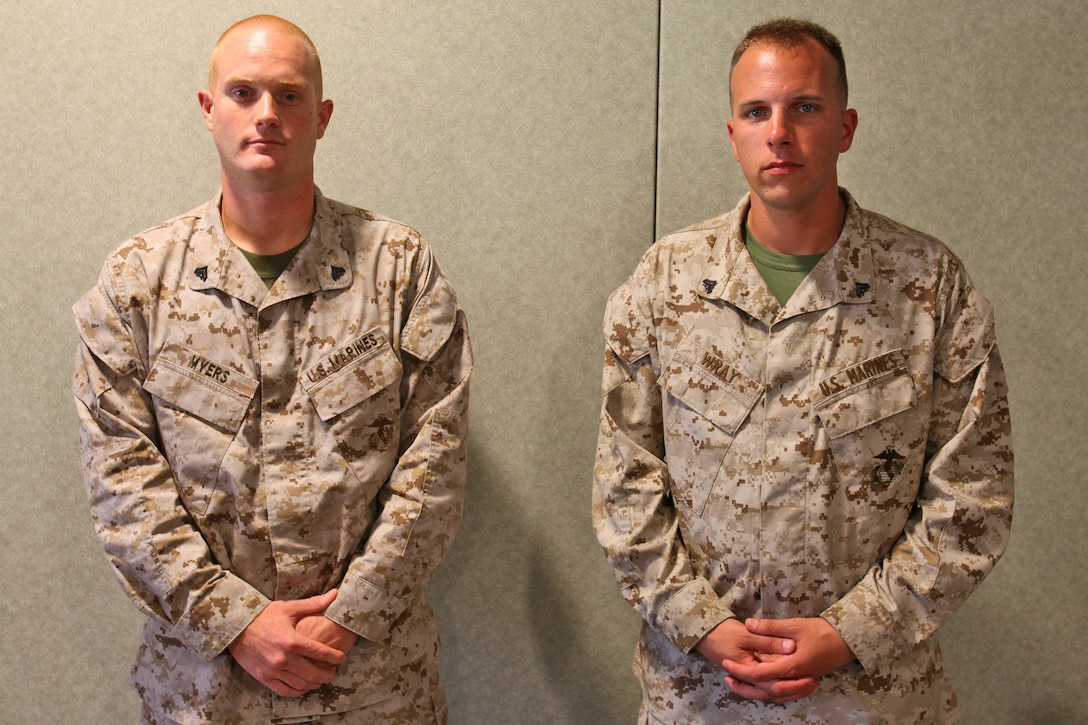 Corporal Jeremy W. Myers, left, and Cpl. Nicholas C. Wray, both combat engineers with Bridge Company, 7th Engineer Support Battalion, 1st Marine Logistics Group, pose for a photograph in their office aboard Camp Pendleton, Calif., July 24, 2013. Myers and Wray will join other members of the U.S. Armed Forces and Sri Lankan Military as they provide 
medical, dental and engineering aid to locals in Sri Lanka during Pacific Angel 13-4. The two combat engineers are slated to repair and reconstruct schools, including building bamboo blinds, painting walls, patching holes and building roofs. 
