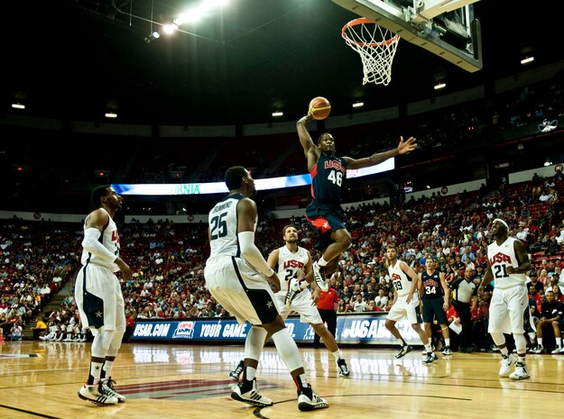 Harrison Barnes, USA Men’s Blue team player, goes up for a dunk during the first half of the USA Blue vs. White Basketball game at the Thomas and Mack Center July 25, 2013, in Las Vegas. Barnes scored 18 points for the Blue team. The USA Basketball Association invited four Airmen from Nellis and Creech Air Force Bases who recently came home from deployment and one, a wounded warrior, to recognize them during the game. (U.S. Air Force photo by Senior Airman Daniel Hughes)  