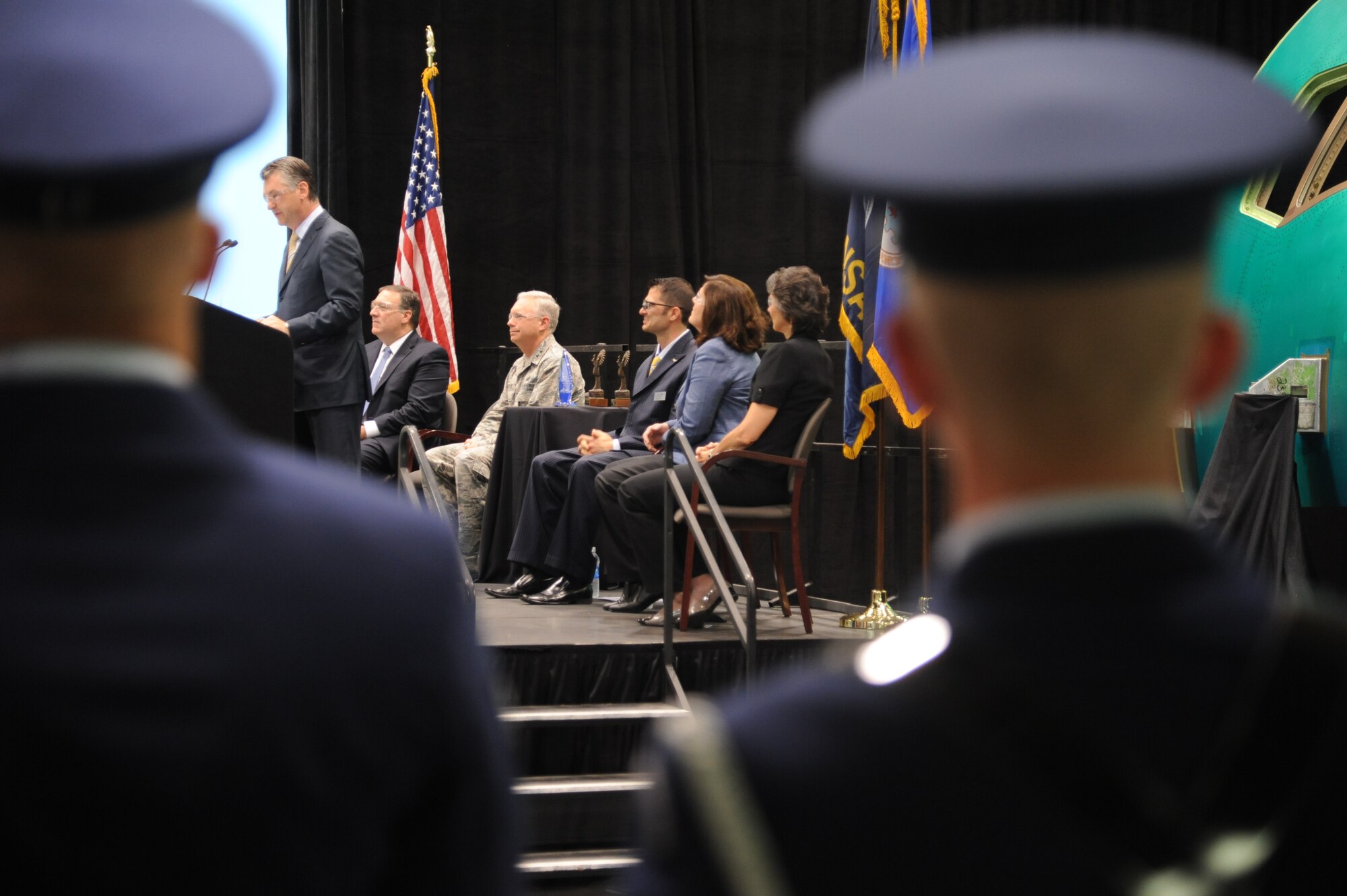 McConnell Air Force Base Honor Guard members observe elected officials and community guests at the KC-46A Forward Fuselage Rollout July 26, 2013, in Wichita, Kan. When the KC-46A reaches its operational status it will provide improved refueling capabilities to assist U.S., joint, allied and coalition forces and better support global humanitarian missions.  (U.S. Air Force photo/Airman 1st Class John Linzmeier)