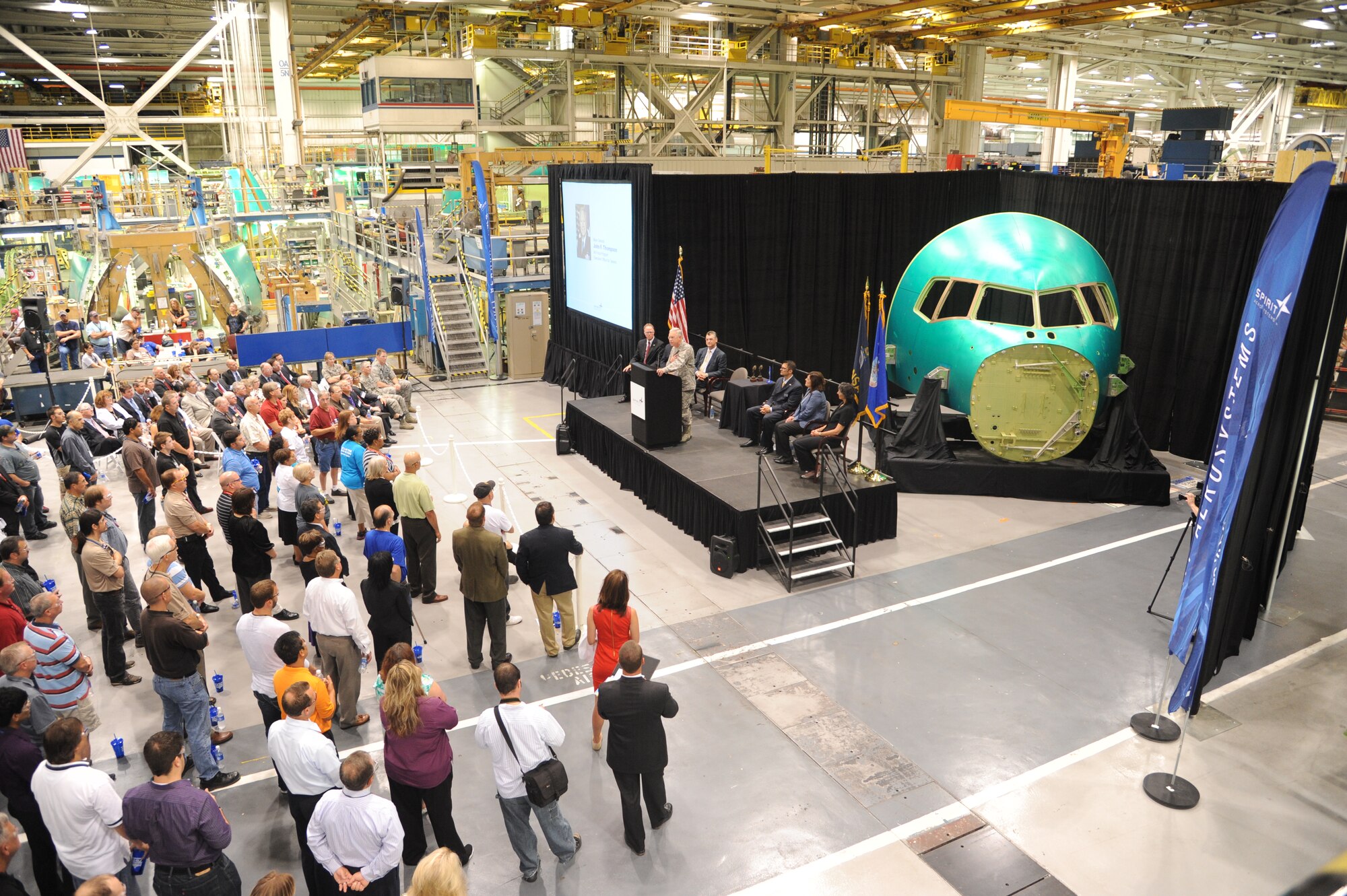 Spirit AeroSystems reveals the cockpit of a KC-46A at the KC-46A Forward Fuselage rollout July 26, 2013, in Wichita, Kan. The air refueling tanker was based on the Boeing 767 commercial airplane and will replace the Air Force’s aging fleet of KC-135 Stratotankers. (U.S. Air Force photo/Airman 1st Class John Linzmeier)