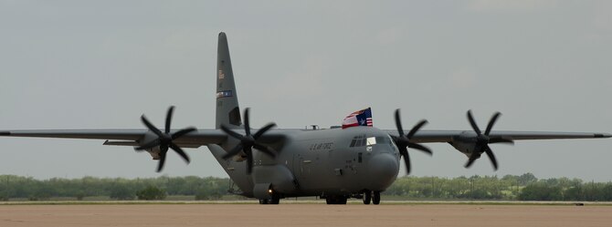 The final C-130J, flown by Gen. Paul J. Selva, Air Mobility Command commader, taxis from the flight line July 25, 2013, at Dyess Air Force Base, Texas.  Selva and the aircrew from the 317th Airlift Group flew the last aircraft home to Dyess, completing the largest and most technologically advanced C-130J fleet in the world. (U.S. Air Force photo by Airman Autumn Velez/Released)