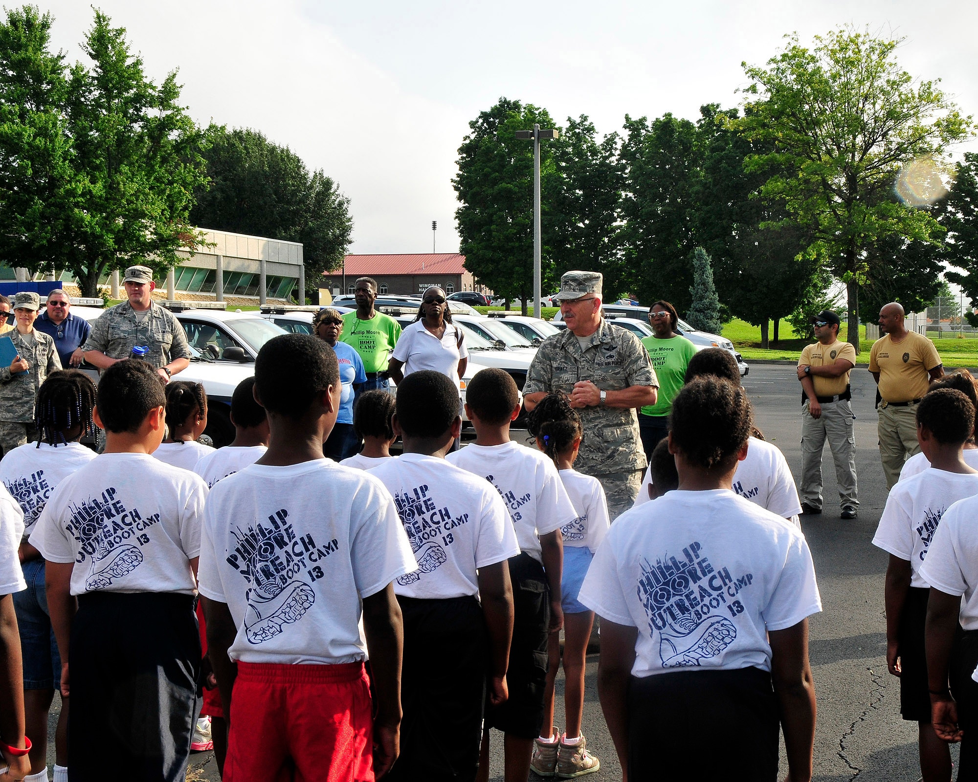 Col Randy Gratz, 134 ARW Vice Commander, speaks to the young members of the Knoxville Police Department Boot Camp Program during their visit to McGhee Tyson ANG Base, Tennessee July 23.  The children are participating in the program to learn opportunities that exist outside of thier local communities. (Air National Guard photo by Master Sgt. Kendra Owenby, 134 ARW Public Affairs)