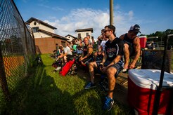 Fans watch the Intramural Softball Championship Game between the 628th Security Forces Squadron and 437th Maintenance Squadron July 24, 2013, at Joint Base Charleston – Air Base, S.C. (U.S. Air Force photo/Senior Airman George Goslin)