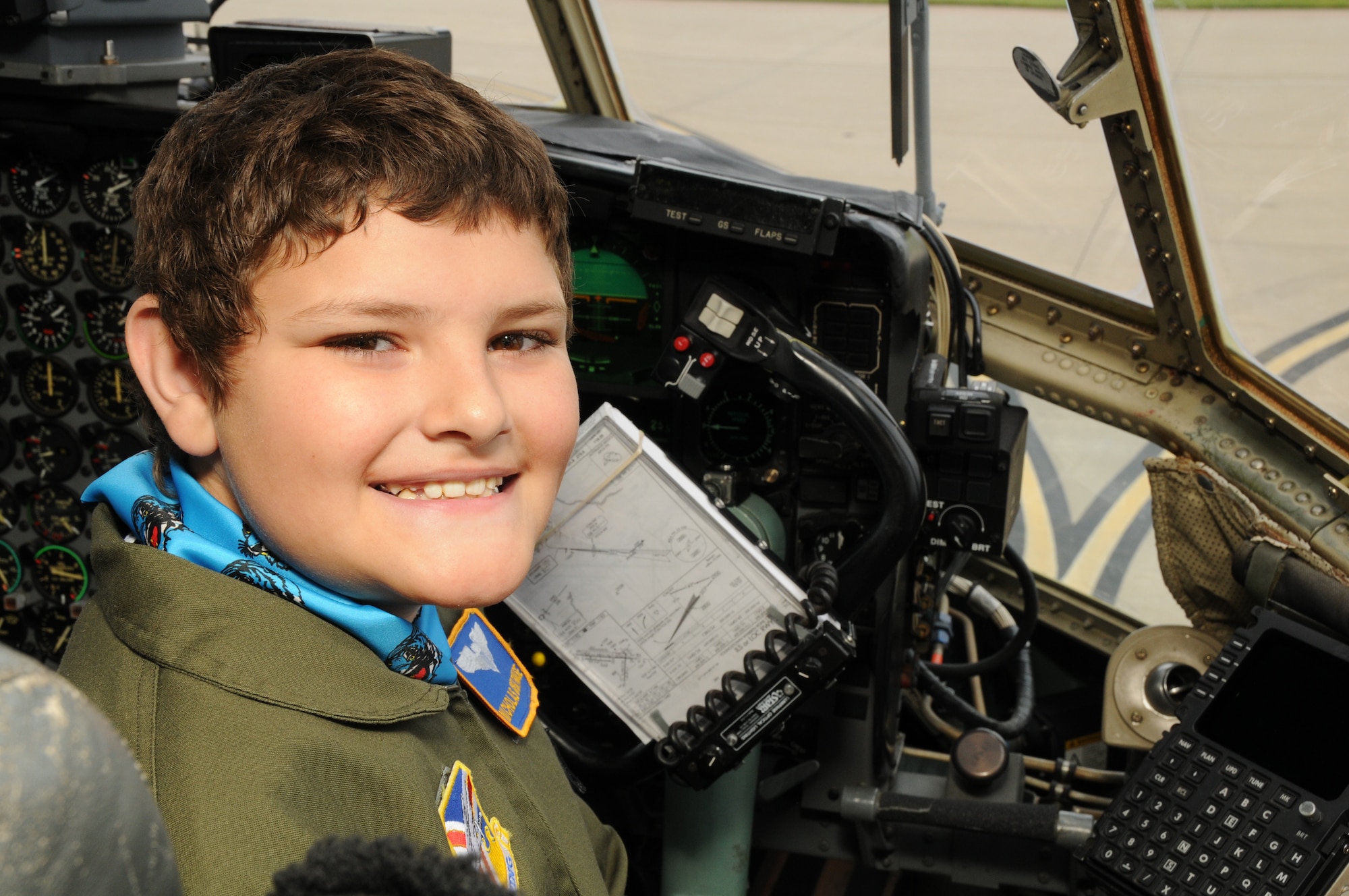YOUNGSTOWN AIR RESERVE STATION, Ohio -- The 910th Airlift Wing's 54th Pilot for a Day, honorary 2nd Lieutenant Nicholas Greathouse, poses in the pilot's chair of a C-130H Hercules aircraft here, July 24. Pilot for a Day is a community outreach program that works through Akron Children's Hospital Boardman to welcome children with chronic or life-threatening illnesses to the station for a day of military experiences.