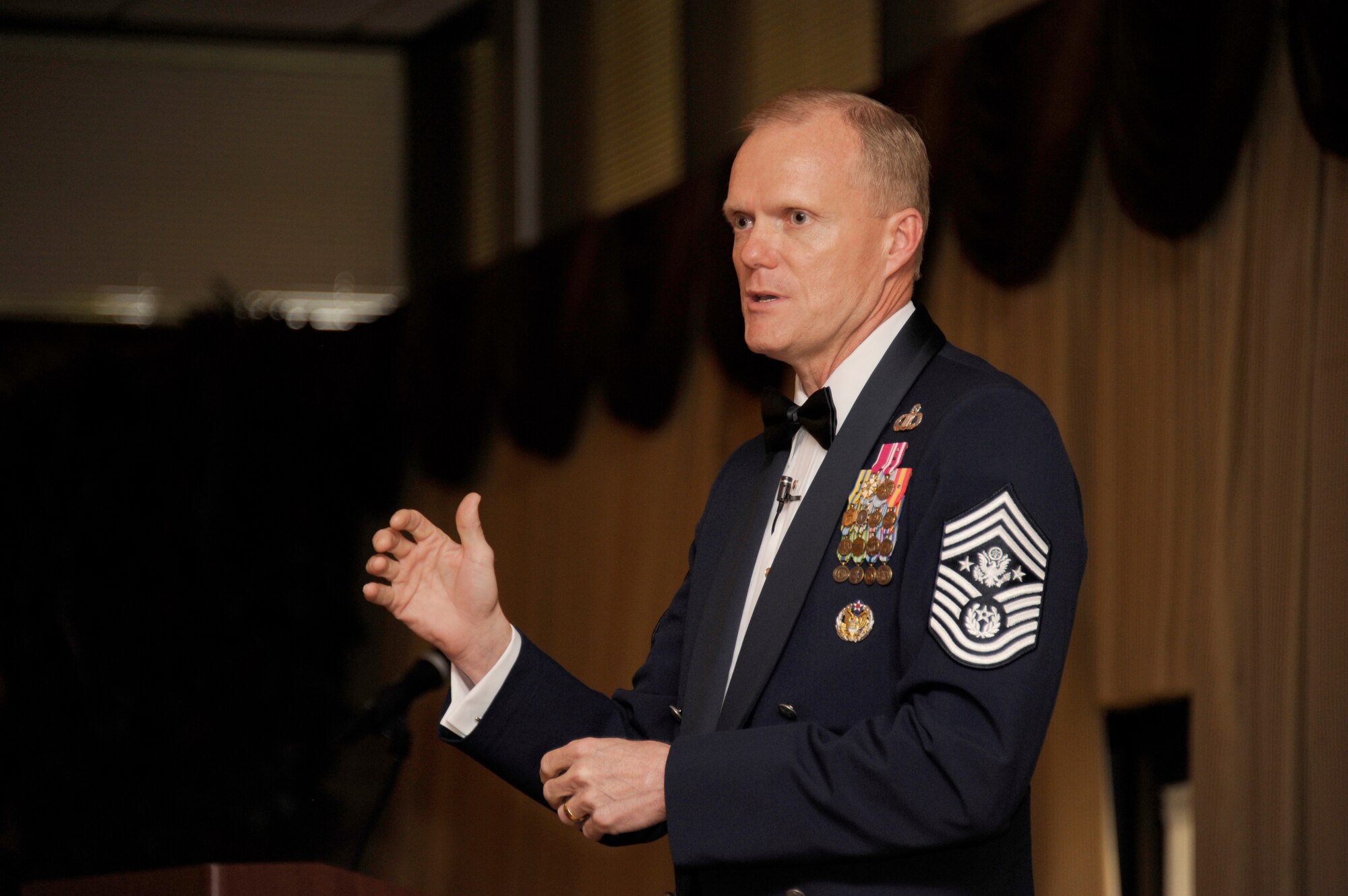 Chief Master Sgt. of the Air Force James Cody addresses a group of 75 master sergeant selects and their families at the annual Senior Noncommissioned Officer Induction Ceremony July 19, 2013, at the Tommy B. McGuire Community Center on Joint Base McGuire-Dix-Lakehurst, N.J. The chief spent the day speaking to joint base personnel at an all-call and also to the future SNCOs and the First-Term Airman Center. (U.S. Air Force photo by Airman Tara A. Williamson/Released)