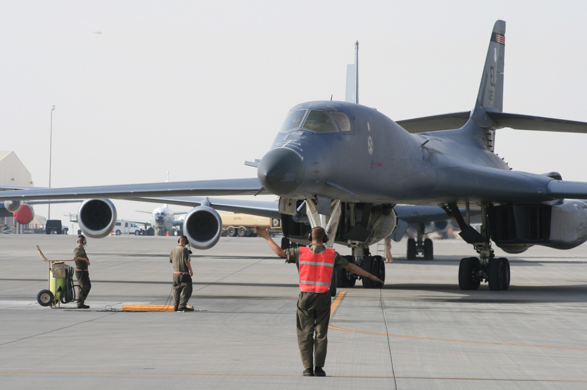 Airmen from the 34th Expeditionary Bomb Squadron aircraft maintenance unit maintain B-1B Lancers at the 379th Air Expeditionary Wing in Southwest Asia, April 2, 2013. The multi-mission B-1 is the backbone of America's long-range bomber force. It can rapidly deliver massive quantities of precision and non-precision weapons against any adversary, anywhere in the world, at any time. (U.S. Air Force photo/Master Sgt. Charles Bridges)