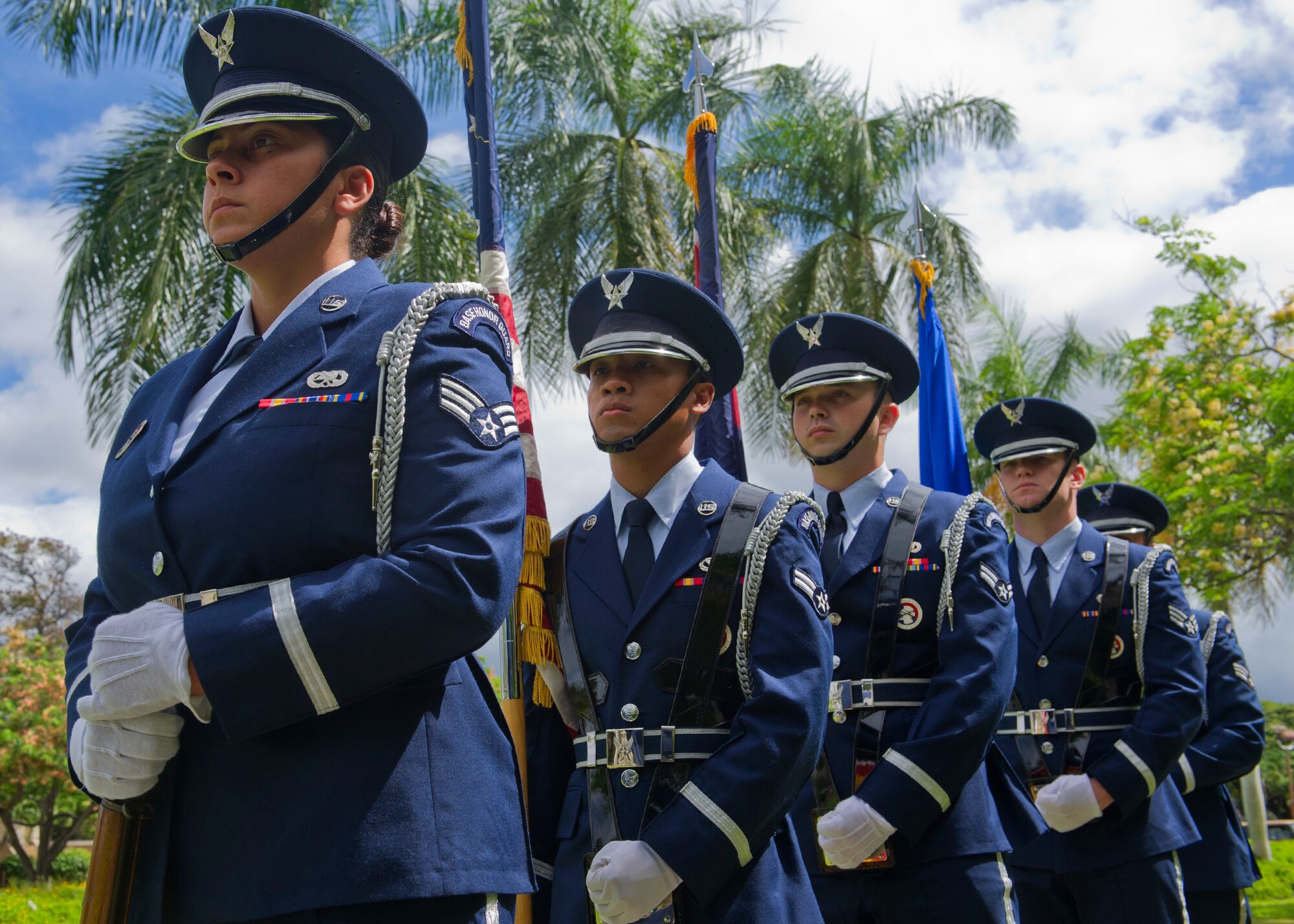Members of the 15th Wing Honor Guard stand at parade rest prior to a Bronze Star medal ceremony in honor of former U.S. Army Capt. Myron “Skip” Kawakami at the 15th WG headquarters building on Joint Base Pearl Harbor-Hickam, Hawaii, July 26, 2013. During the ceremony, Col. Johnny Roscoe, 15th WG commander, presented a Bronze Star to Kawakami, for service in the Vietnam War. (U.S. Air Force photo/Tech. Sgt. Jerome S. Tayborn)
