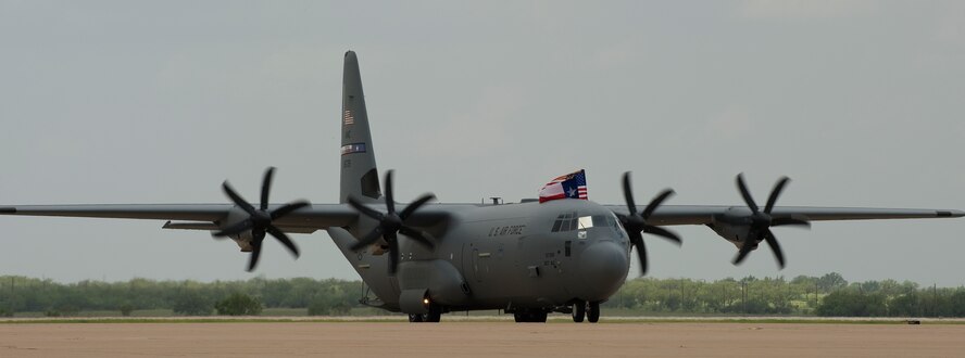 The final C-130J, flown by Gen. Paul J. Selva, Air Mobility Command commader, taxis from the flight line July 25, 2013, at Dyess Air Force Base, Texas.  Selva and the aircrew from the 317th Airlift Group flew the last aircraft home to Dyess, completing the largest and most technologically advanced C-130J fleet in the world. (U.S. Air Force photo by Airman Autumn Velez/Released)