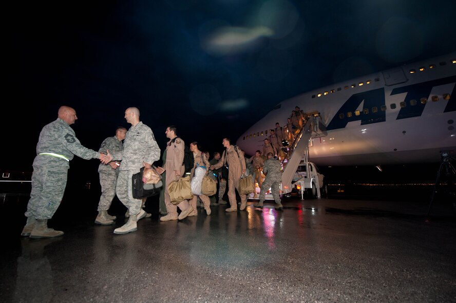 Base leaders welcome home nearly 400 Ellsworth Airmen during a welcome home event at Ellsworth Air Force Base, S.D., July 26, 2013. The Airmen returned home from a six-month deployment in support of operations in Southwest Asia. (U.S. Air Force photo by Airman 1st Class Zachary Hada/Released)