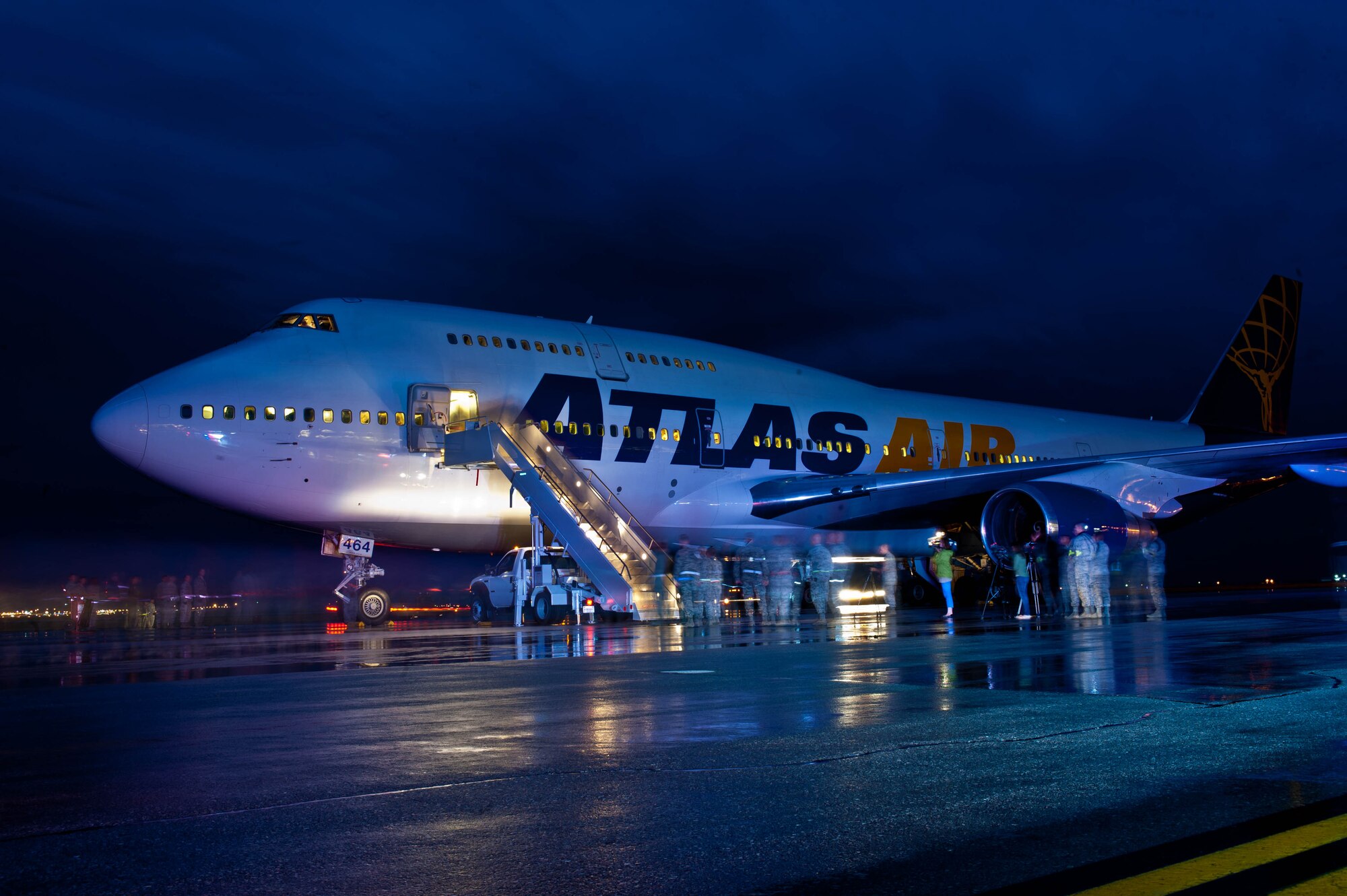 A commercial 747 carrying nearly 400 Ellsworth Airmen returning from a deployment to Southwest Asia touched down just after thunderstorms moved through the area at Ellsworth Air Force Base, S.D., July 26, 2013. Airmen provided critical air presence, precision strike, and surveillance and reconnaissance capabilities to support military objectives in the U.S. Central Command area of responsibility. (U.S. Air Force photo by Airman 1st Class Zachary Hada/Released)