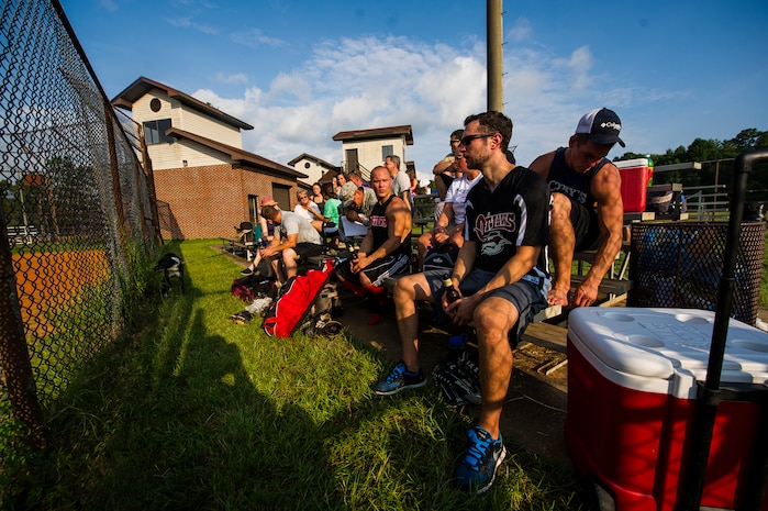 Fans watch the Intramural Softball Championship Game between the 628th Security Forces Squadron and 437th Maintenance Squadron July 24, 2013, at Joint Base Charleston – Air Base, S.C. (U.S. Air Force photo/Senior Airman George Goslin)