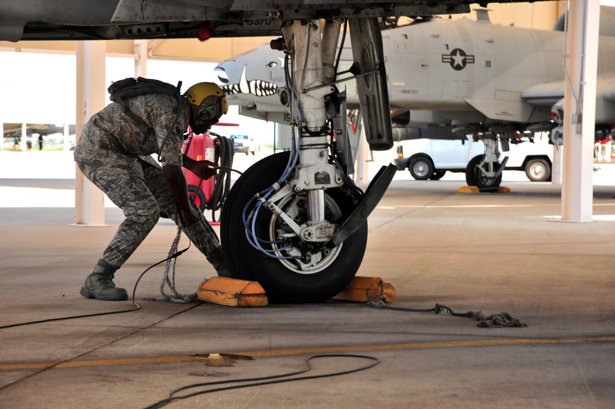 U.S. Air Force Airman 1st Class Sean Smith, 372nd Training Squadron student, performs his first recovery at Davis-Monthan Air Force Base, Ariz., July 23, 2013. The 372nd TRS uses A-10 Warthogs as a tool to help teach students before they reach their first base.(U.S. Air Force photo by Airman 1st Class Josh Slavin/Released)