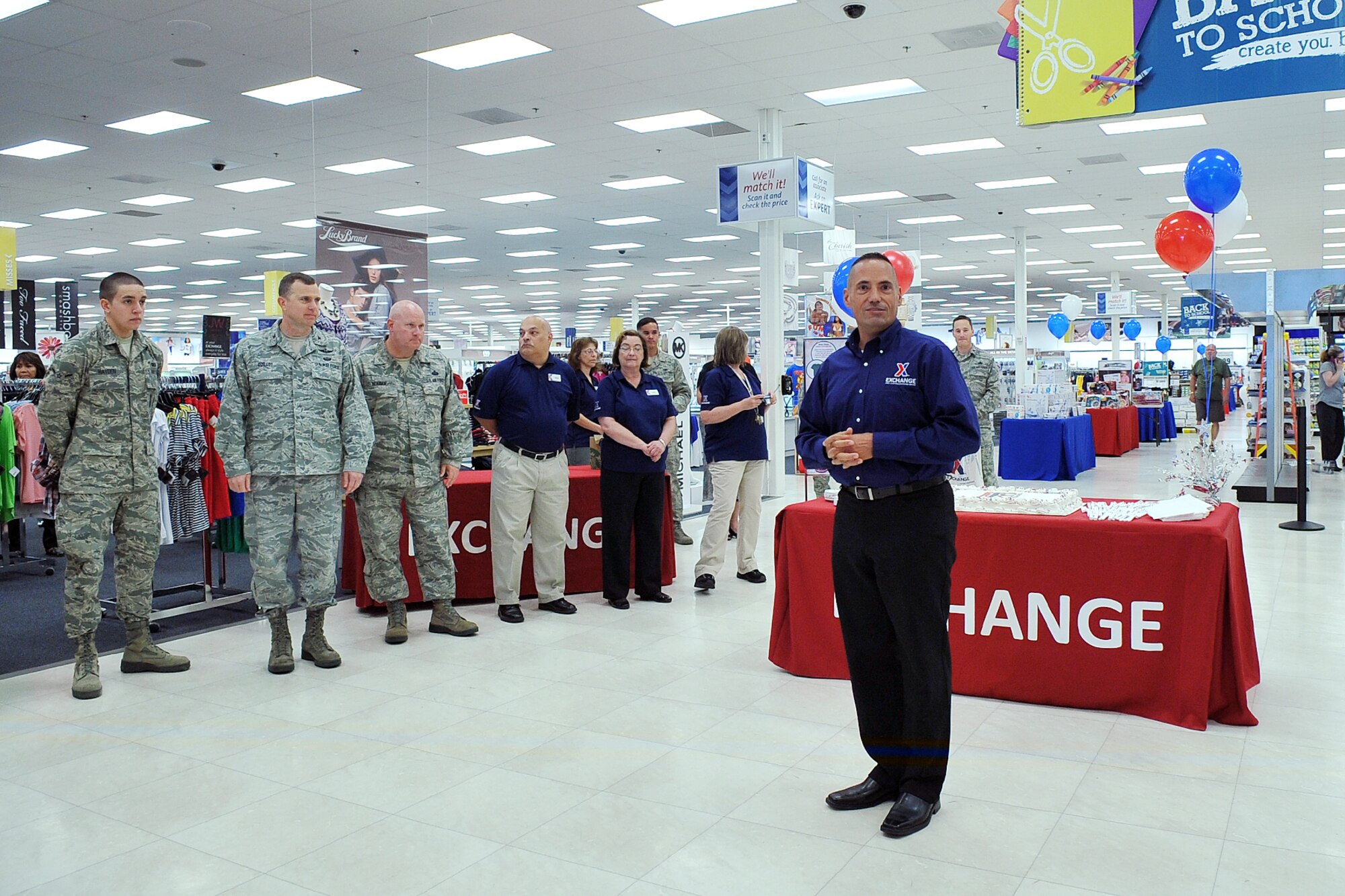 Daniel E. Wise, Offutt Air Force Base Exchange general manager, addresses a group of exchange employees and customers as part of a ceremony celebrating the Army and Air Force Exchange Service’s 118th birthday, here, July 25. AAFES is an agency of the U.S. Department of Defense with two missions -- provide quality merchandise and services to 8.7 million active duty, National Guard, reserve members, military retirees and their family members, at uniformly low prices; and  generate reasonable earnings for the support of Army morale, welfare and recreation and Air Force services programs. AAFES now operates more than 10,800 activities, including: retail stores, catalog services, bookstores, class six package stores, concessions, food facilities, florists, gas stations and auto repair, laundry and dry cleaners, barber and beauty shops, military clothing sales stores, movie theaters, vending centers and video rental.  (U.S. Air Force photo by Charles Haymond/Released)