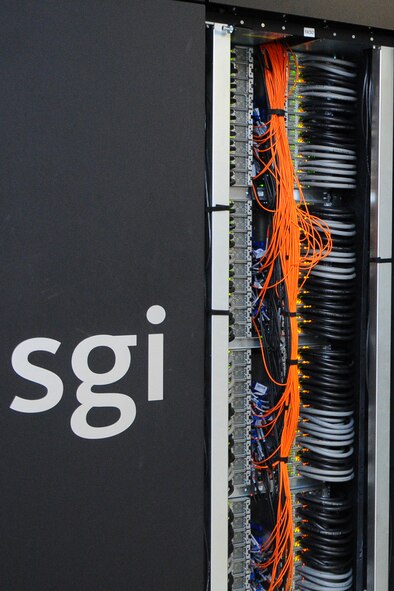 At a Glance:  Named after the Air Force B-2 advanced fighter for its power and ability to deliver, “Spirit” is powered with 9,216 sockets (73,728 cores) powered by Intel 8-core processors operating at 2.6 GHz, boosting the peak performance to more than 1.5 petaflops, making it the 14th-fastest supercomputer in the world, according to TOP500 (www.top500.org). The SGI ICE X Spirit Supercomputer is housed in 32 M-racks, which provide water cooling directly to the CPUs. The system has 144 terabytes of main memory and 6.72 PB of file storage. To put this in perspective, a typical desktop has a single dual-core processor and can contain upwards of eight gigabytes of memory and 1 terabyte of disk space. This supercomputer has 36,000 times more power. (U.S. Air Force photo by Niki Jahns)