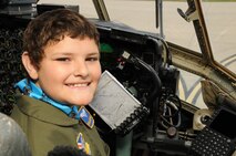 YOUNGSTOWN AIR RESERVE STATION, Ohio -- The 910th Airlift Wing's 54th Pilot for a Day, honorary 2nd Lieutenant Nicholas Greathouse, poses in the pilot's chair of a C-130H Hercules aircraft here, July 24. Pilot for a Day is a community outreach program that works through Akron Children's Hospital Boardman to welcome children with chronic or life-threatening illnesses to the station for a day of military experiences.