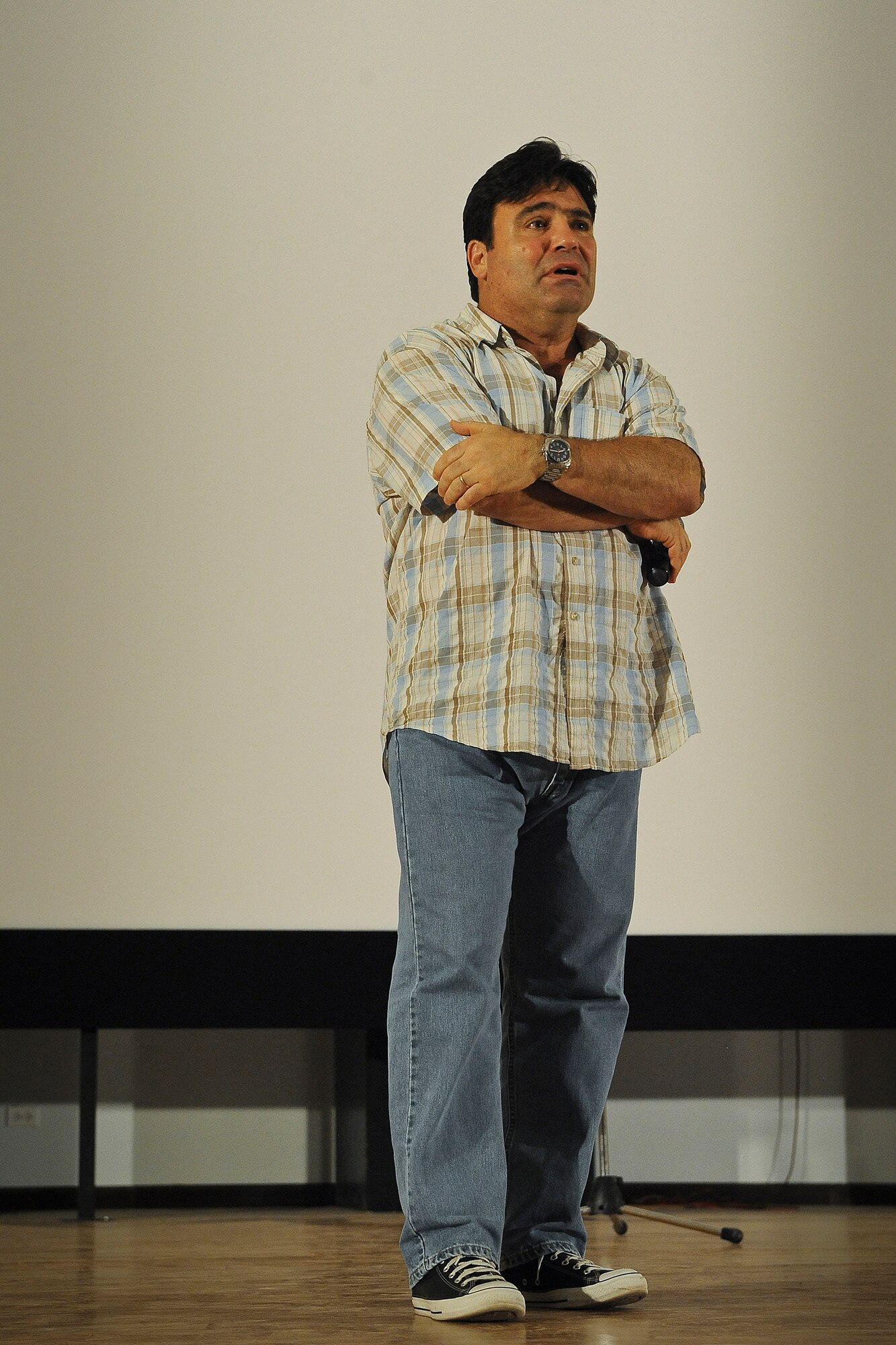 Comedian Sam Fedele feigns exasperation during his routine for the Airmen of the 386th Air Expeditionary Wing, Saturday, July 20, 2013.  
“Like my shoes?  Kind of young, kind of cool, kind of hip?”
 “You know what’s not cool and young and hip?”
“The orthopedic arches I have inside them!” (U.S. Air Force Photo by 1st Lt. Nathan Wallin)
