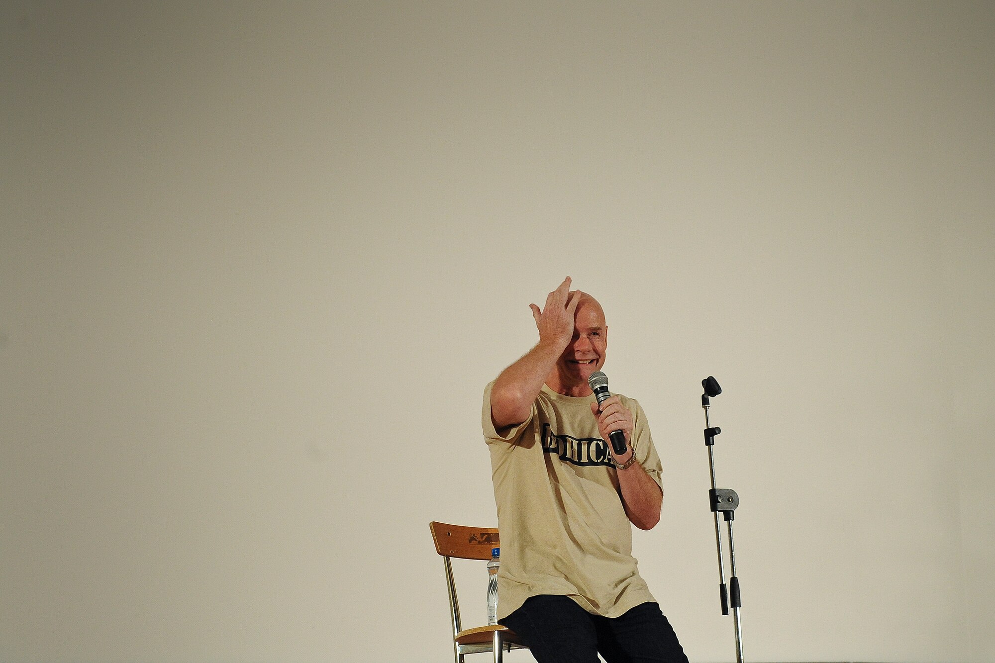 “Spanky” takes a moment to compose himself between jokes during his set at an undisclosed location in Southwest Asia, Saturday, July 20, 2013.   “120 degrees!?  I’ve never been so hot,” he said.
“I think today I saw Optimus Prime transform into an air conditioner.”  (U.S. Air Force Photo by 1st Lt. Nathan Wallin)
