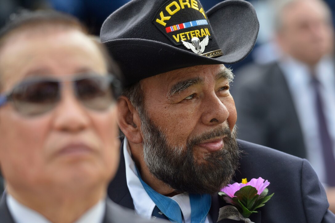 A Korean War veteran watches as President Barack Obama and Defense Secretary Chuck Hagel mark the 60th anniversary of the armistice ending the Korean War at the Korean War Memorial in Washington, D.C., July 27, 2013.