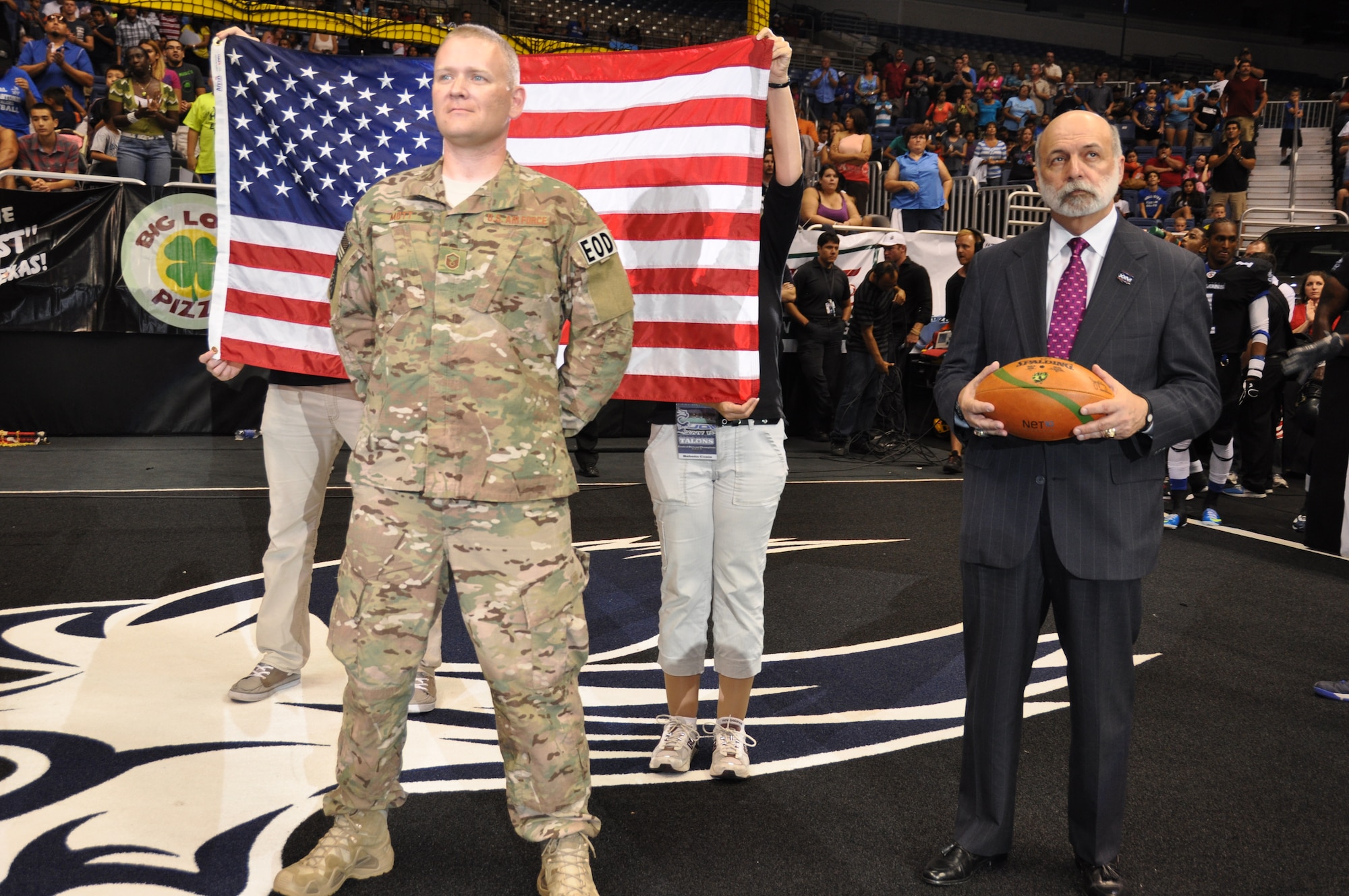 Master Sgt. Robert Mott, 433rd EOD Flight Program Manager, was honored during a ceremony in the third quarter of the San Antonio Talons versus Philadelphia Soul game on July 27.  The crowd of 9,112 witnessed AFL Commissioner Jerry Kurz, along with the Talons, honor Mott during the third quarter in recognition of his receiving the Bronze Star for his actions in Fallujah, Iraq.  (Photo by Tech Sgt. Carlos J. Trevino)