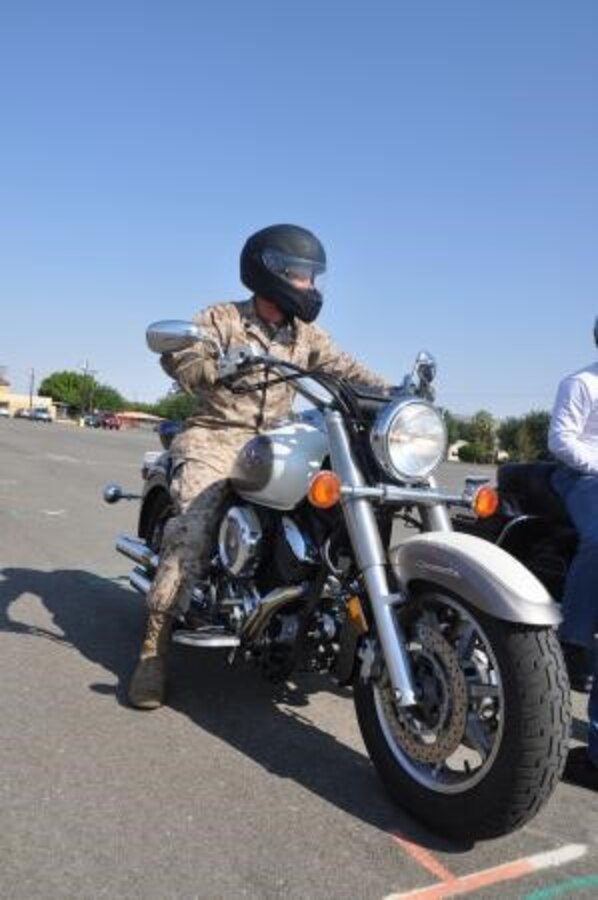 Staff Sergeant Jeffery Worley, a substance abuse counselor on Marine Corps Logistics Base Barstow, Calif., readies himself to ride his motorcycle in the advanced riders course, July 19. The course gives riders an opportunity to perfect their riding technique.


