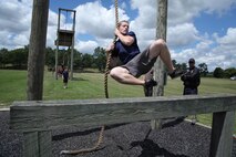 A Poolee with RS St. Louis maneuvers over an obstacle during a monthly pool function July 27 in Greenville, Ill. For additional imagery visit https://www.facebook.com/stlouismarines?ref=tn_tnmn#!/stlouismarines. (U.S. Marine Corps photo by Cpl. Erik S. Brooks Jr. 