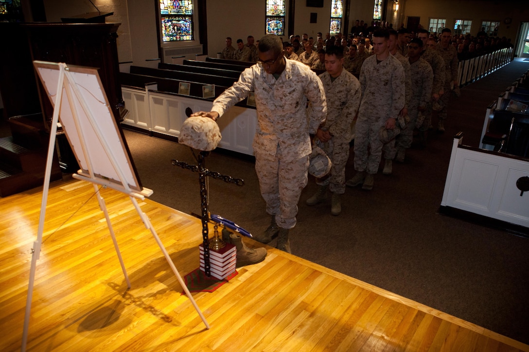 Marines with Bravo Company, 2nd Tank Battalion, 2nd Marine Division, pay their respects to Cpl. Daniel Linnabary II, a brother-in-arms who was killed in action during dismounted combat operations in Now Zad district, Helmand province, Afghanistan, Aug. 6, 2012. "Watching him grow as a Marine, a father and husband, it is one of the proudest feelings that I have," said Louisville, Ky. native, Staff Sgt. Jon Kramer.  "He meant a lot to me.  He may not have been blood, but he was my son, please keep Daniel in your hearts and minds and carry on his legacy.  In his famous last words, "Everything that is going on, get back on the tank, drive on."
