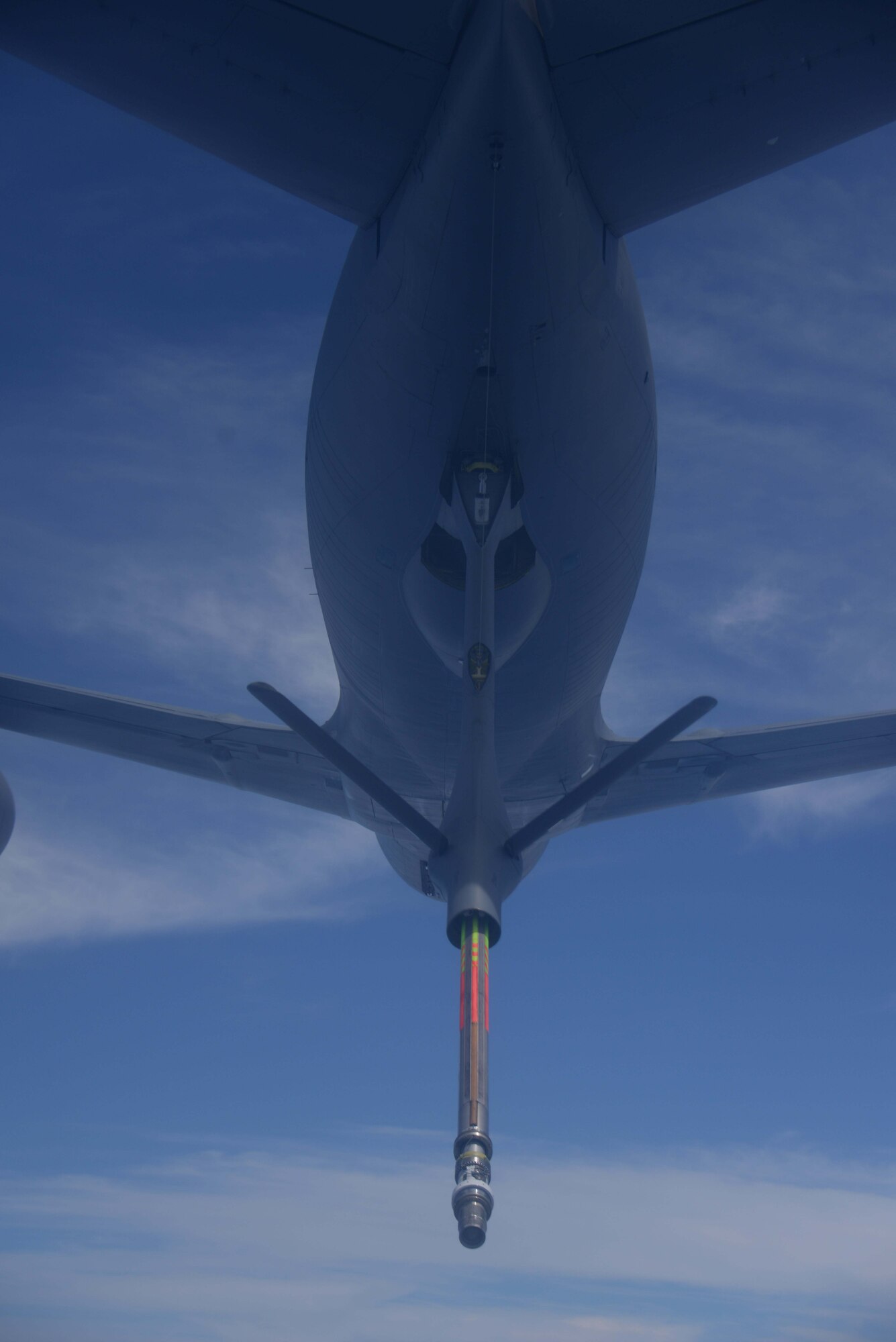 A KC-135 Stratotanker from the 909th Air Refueling Squadron approaches an MC-130P Combat Shadow from the 17th Special Operations Squadron during an air-to-air refueling mission over the East China Sea July 19, 2013.  The squadrons regularly conduct air-to-air refueling missions in order to ensure training proficiency for aircrews in both units.. (U.S. Air Force photo by Tech. Sgt. Kristine Dreyer)