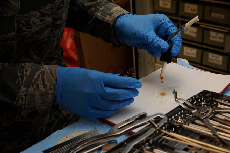 Senior Airman Deborah Sisco, 2nd Dental Squadron dental technician, mixes intermediate restorative material on Barksdale Air Force Base, La., July 24, 2013. IRM is to create fillings that are placed in teeth. (U.S. Air Force photo/Airman 1st Class Andrew Moua)