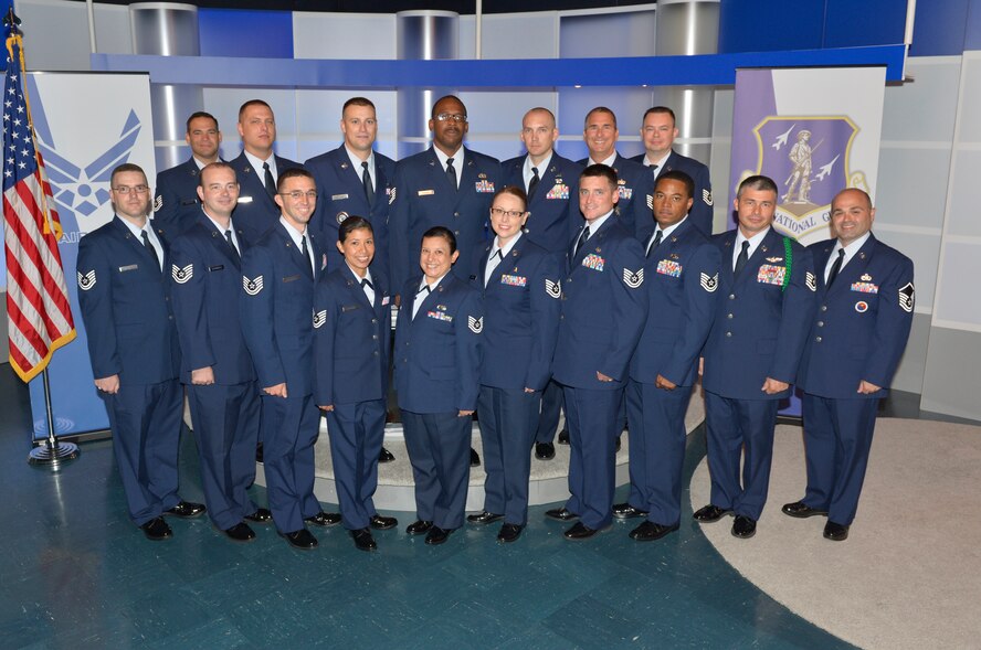 McGHEE TYSON AIR NATIONAL GUARD BASE, Tenn. ?P-flight students attending the Noncommissioned Officer Academy Class 13-7, at the Paul H. Lankford Enlisted Professional Military Education Center, gather in the TEC TV studio for flight photos at The I.G. Brown Training and Education Center here, July 22, 2013. (U.S. Air National Guard photo by Master Sgt. Kurt Skoglund/Released)