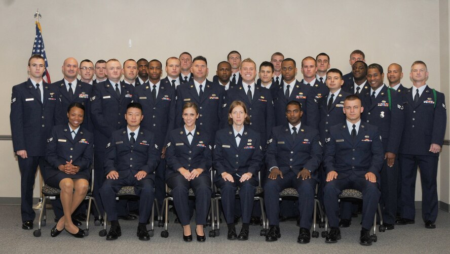 GRISSOM AIR RESERVE BASE, Indiana – A & B flight students attending the Airman Leadership School Class 13-8 gather in the Airman and Family Readiness Center for flight photos at the 434th Air Refueling Wing, July 22, 2013. (U.S. Air Force Reserve photo by Lt Col Gary Lockard/Released)