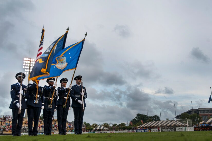 The Joint Base Charleston Honor Guard team presents the colors during the opening ceremonies July 27, 2013, during Military Appreciation Night at Blackbaud Stadium, Daniel Island, S.C. The Charleston Battery hosted Military Appreciation Night to show their support for the local military community. (U.S. Air Force photo/Senior Airman Ashlee Galloway)
