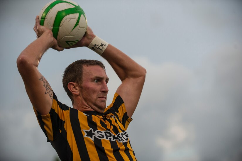 Taylor Mueller of the Charleston Battery, continues play with a throw-in July 27, 2013, during Military Appreciation Night at Blackbaud Stadium, Daniel Island, S.C. The Charleston Battery hosted Military Appreciation Night to show their support for the local military community. (U.S. Air Force photo/Senior Airman Ashlee Galloway)