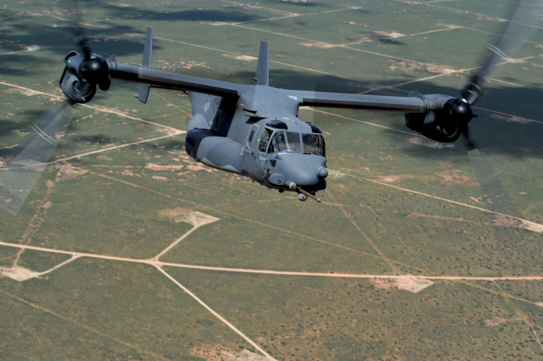 A CV-22 Osprey preforms tactical maneuvers July 22, 2013, over Melrose Air Force Range, N.M. The Osprey flew as part of a training mission for the 522nd Special Operations Squadron. (U.S. Air Force photo/Senior Airman Ericka Engblom)