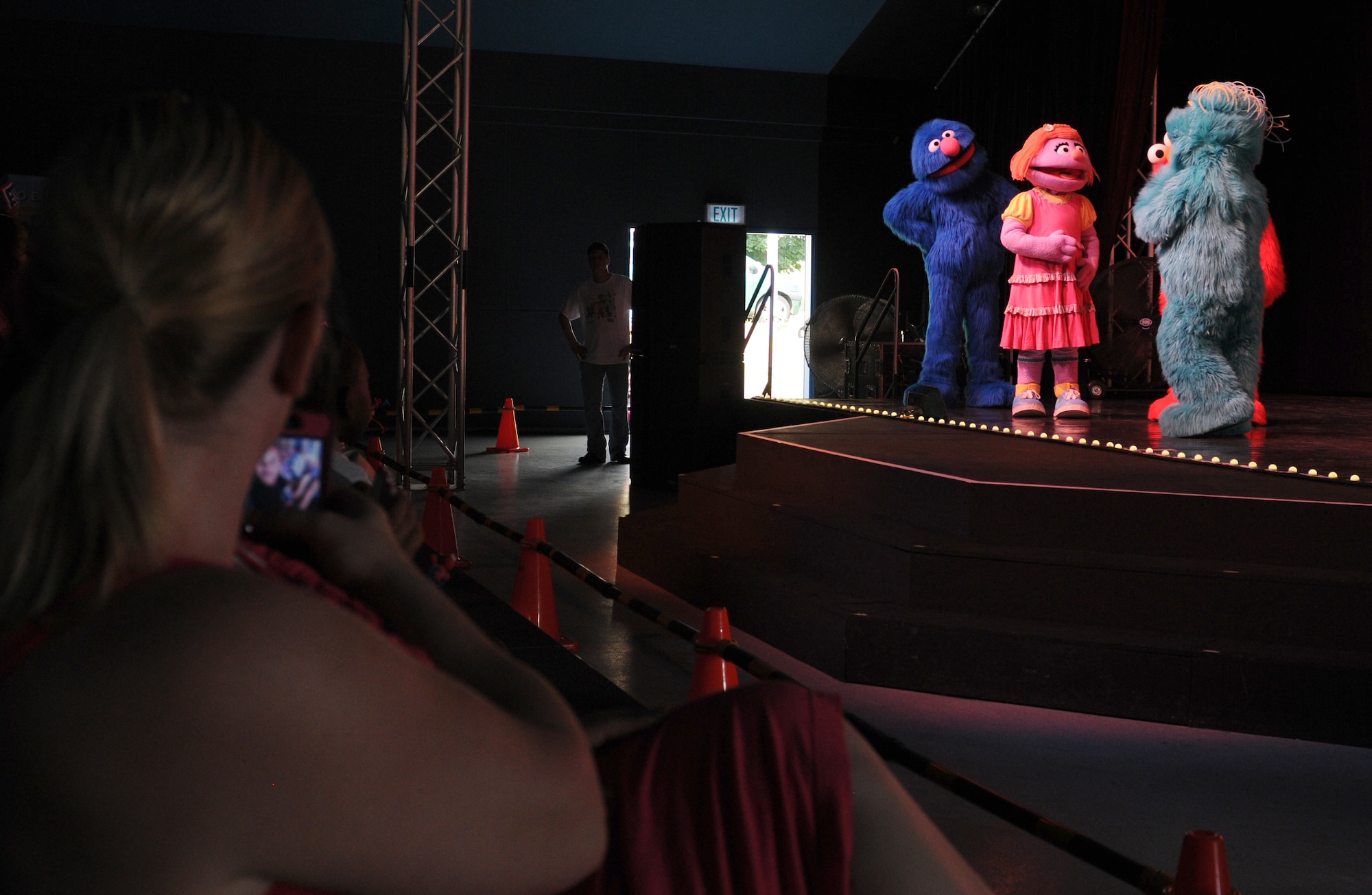 Sesame Street characters perform for members of the KMC during the “Sesame Street USO Experience for Military Families” show, July 24, 2013, Kleber Kaserne, Germany. Members of the show are traveling to U.S. military bases around the world in support of military members and their families. (U.S. Air Force photo/Airman 1st Class Holly Mansfield)