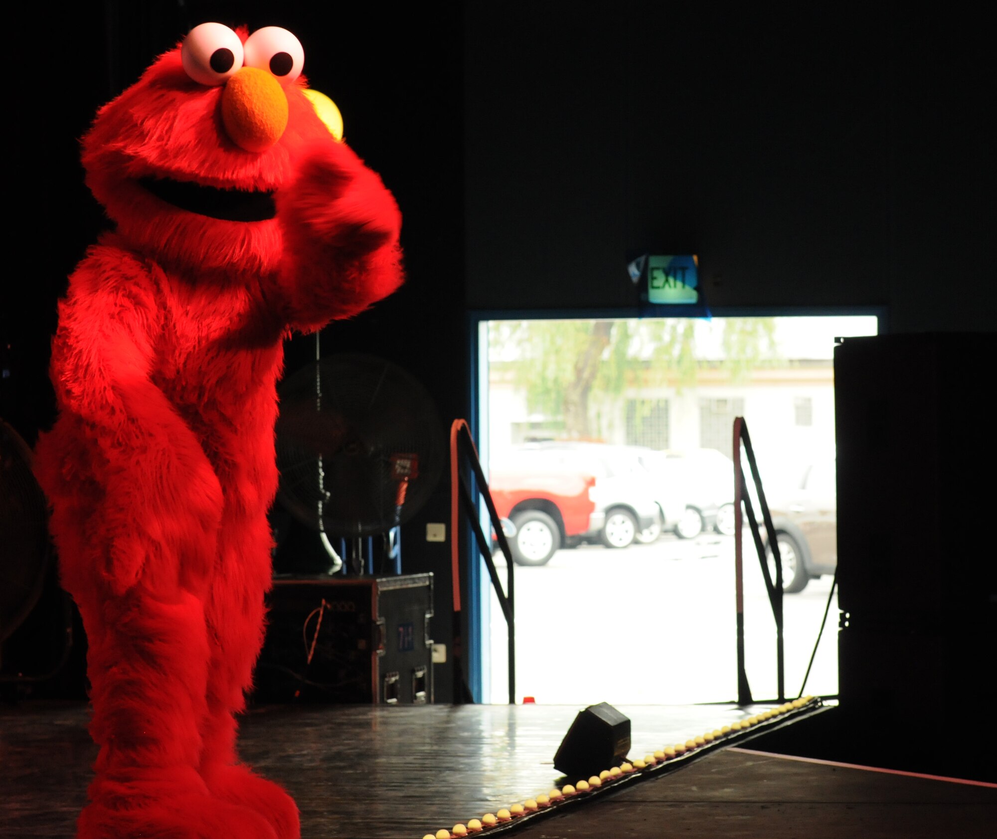A Sesame Street character performs for members of the KMC during the “Sesame Street USO Experience for Military Families” show, July 24, 2013, Kleber Kaserne, Germany. Members of the show are traveling to U.S. military bases around the world in support of military members and their families. (U.S. Air Force photo/Airman 1st Class Holly Mansfield)
