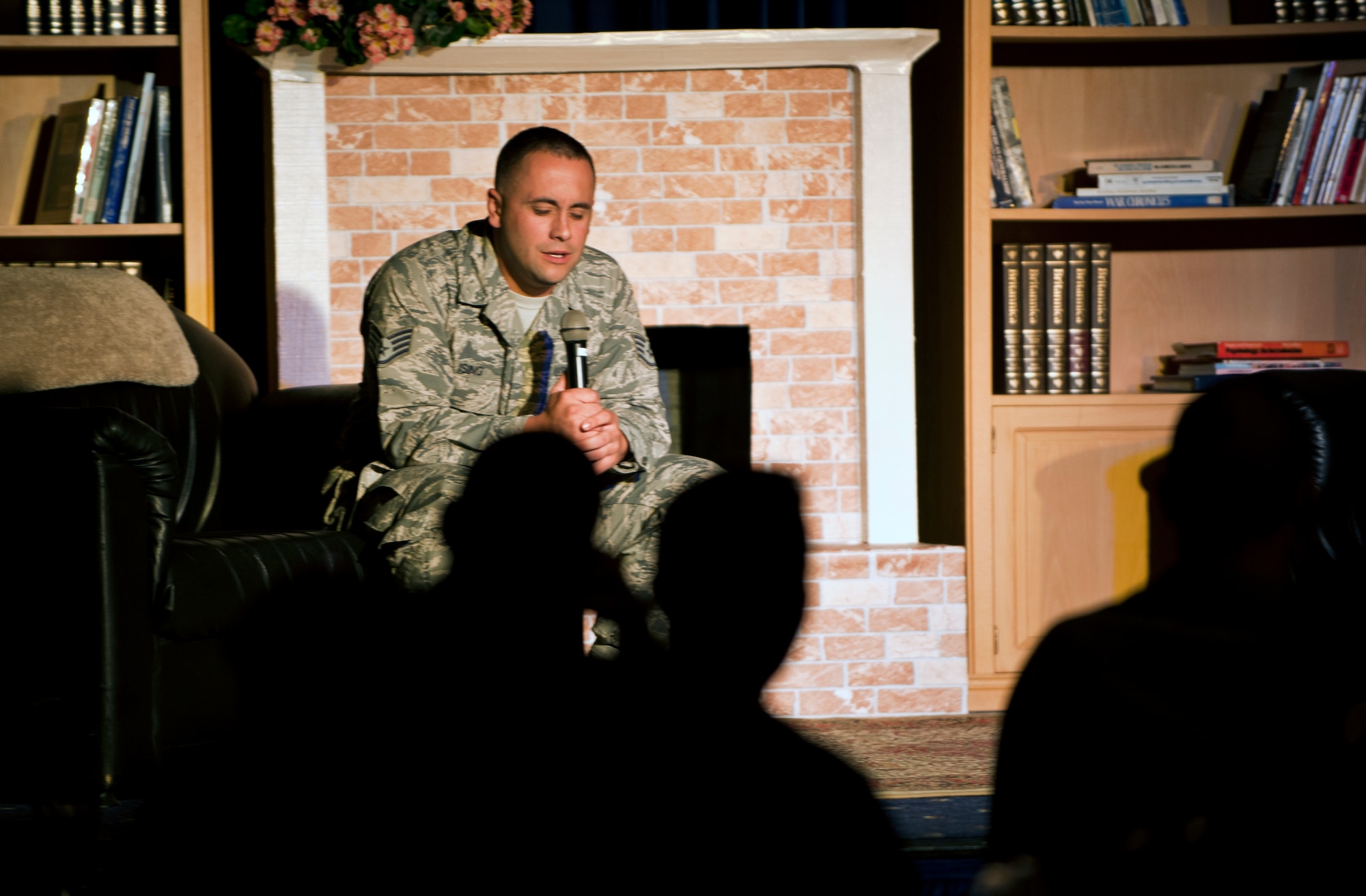 Staff Sgt. Pete Ising, American Forces Network-Incirlik broadcaster, shares a story from high school during Storytellers III July 27, 2013, at Incirlik Air Base, Turkey. Storytellers was created by members of the Incirlik Toastmasters Club in 2012 in response to an open question from Chief Master Sgt. of the Air Force James Roy on how to create community connections and open dialogue among Airmen. (U.S. Air Force photo by Senior Airman Daniel Phelps/Released)
