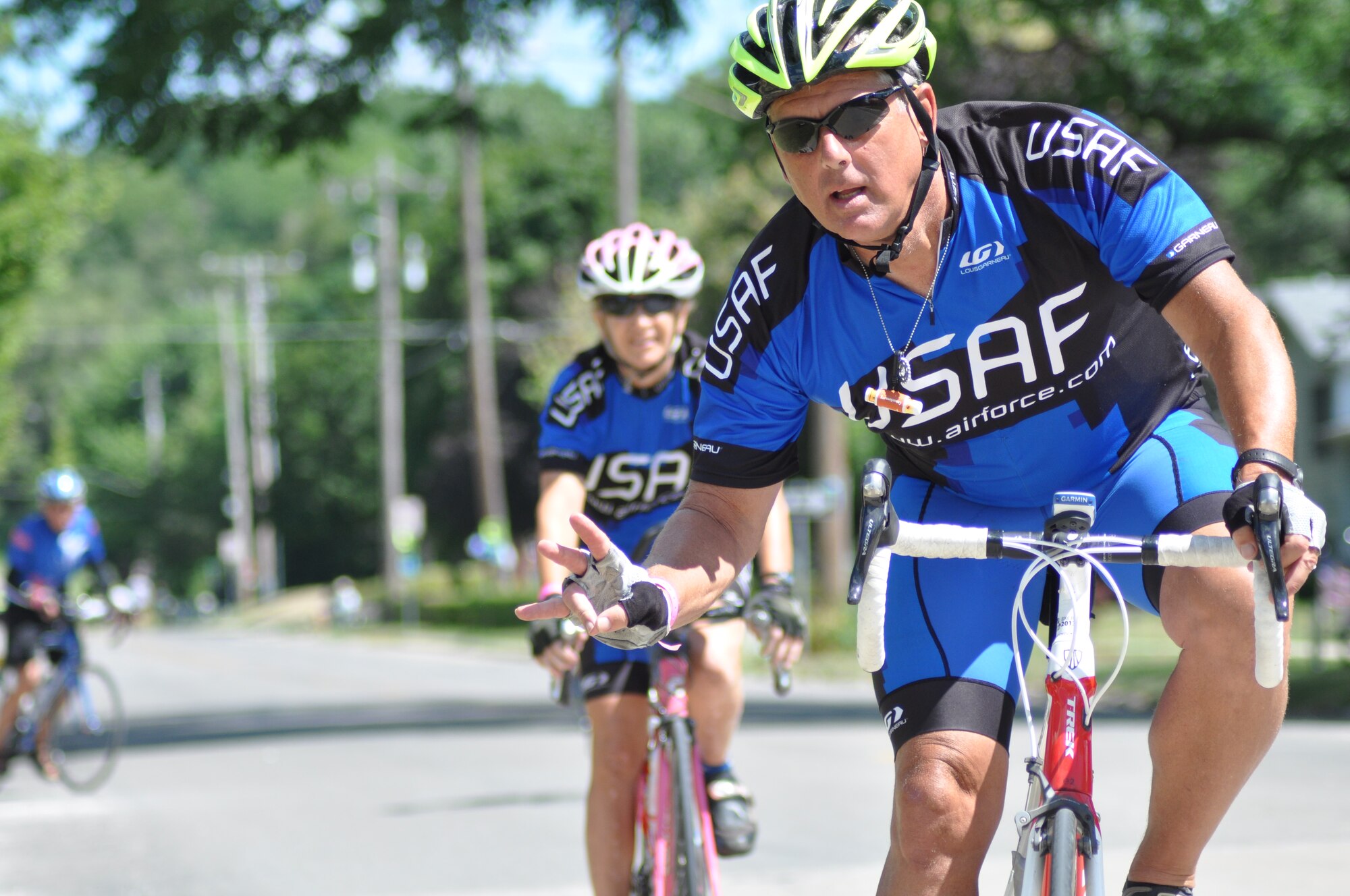 Bob Lindner, a member of the Air Force Cycling Team cycles into Fort Madison, Iowa, the last stop of the Register's Annual Great Bicycle Ride Across Iowa, July 27, 2013.  The AFCT is open to all active duty, Reserve and Gurad Airmen and their families, as well as Air Force civilians and retired Air Force members. (U.S. Air Force photo by Staff Sgt. Abigail Klein)