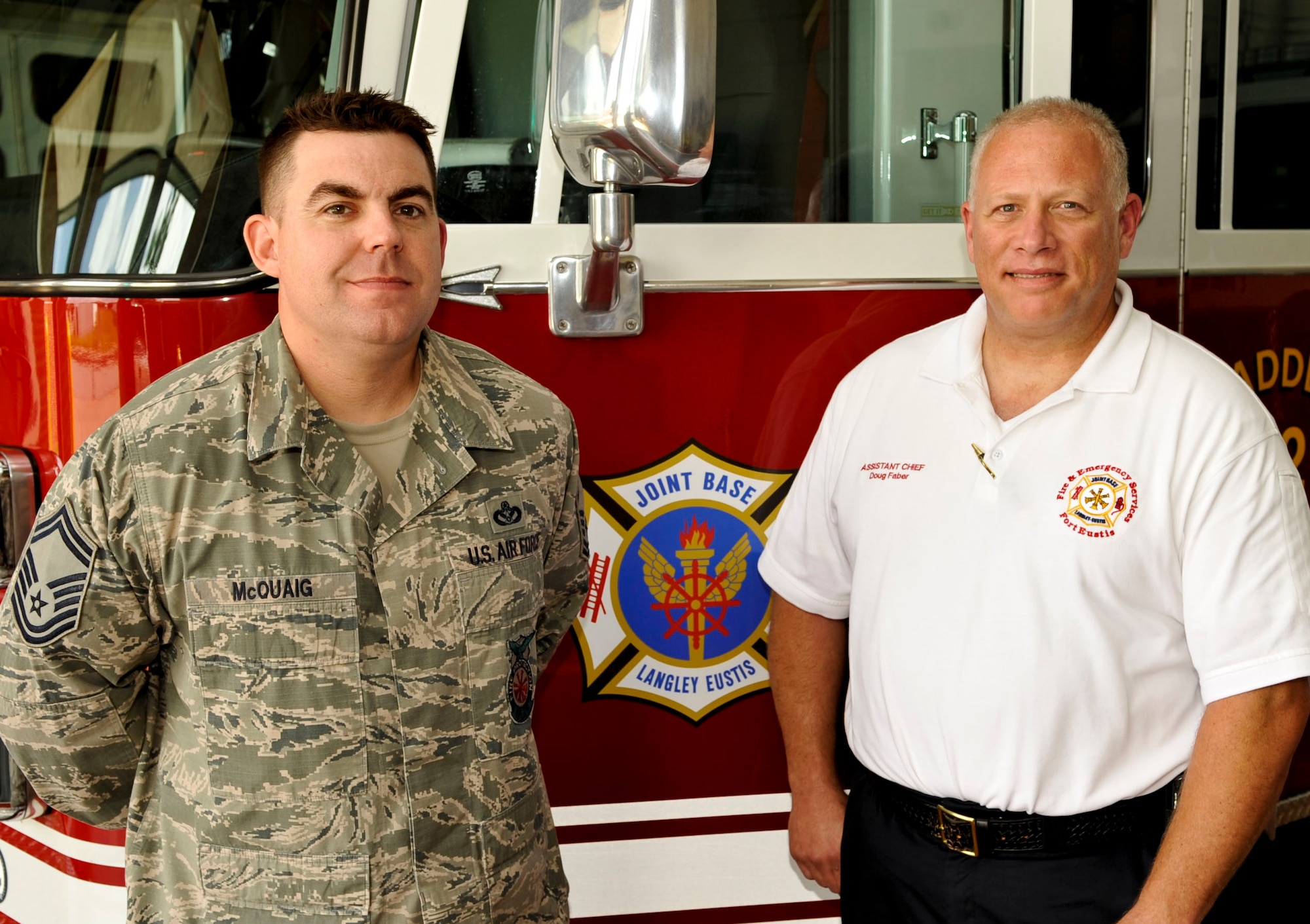 From left, U.S. Air Force Senior Master Sgt. Matthew McQuaig, Langley Air Force Base, Va., deputy fire chief of fire and emergency services, and Douglas Faber, Fort Eustis, Va., assistant chief of prevention and public education, are two of 913 firefighters nationwide to hold the designation of Chief Fire Officer. The CFO designation recognizes firefighters who have demonstrated excellence and outstanding achievement throughout their careers and developed a strategy for continued career improvement and development. (U.S. Air Force photo by Staff Sgt. Wesley Farnsworth/Released)