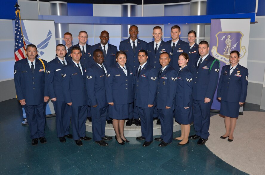 McGHEE TYSON AIR NATIONAL GUARD BASE, Tenn. - E-flight students attending Airman Leadership School Class 13-6, at the Paul H. Lankford Enlisted Professional Military Education Center, gather in the TEC TV studio for flight photos at The I.G. Brown Training and Education Center here, July 22, 2013. (U.S. Air National Guard photo by Master Sgt. Kurt Skoglund/Released)