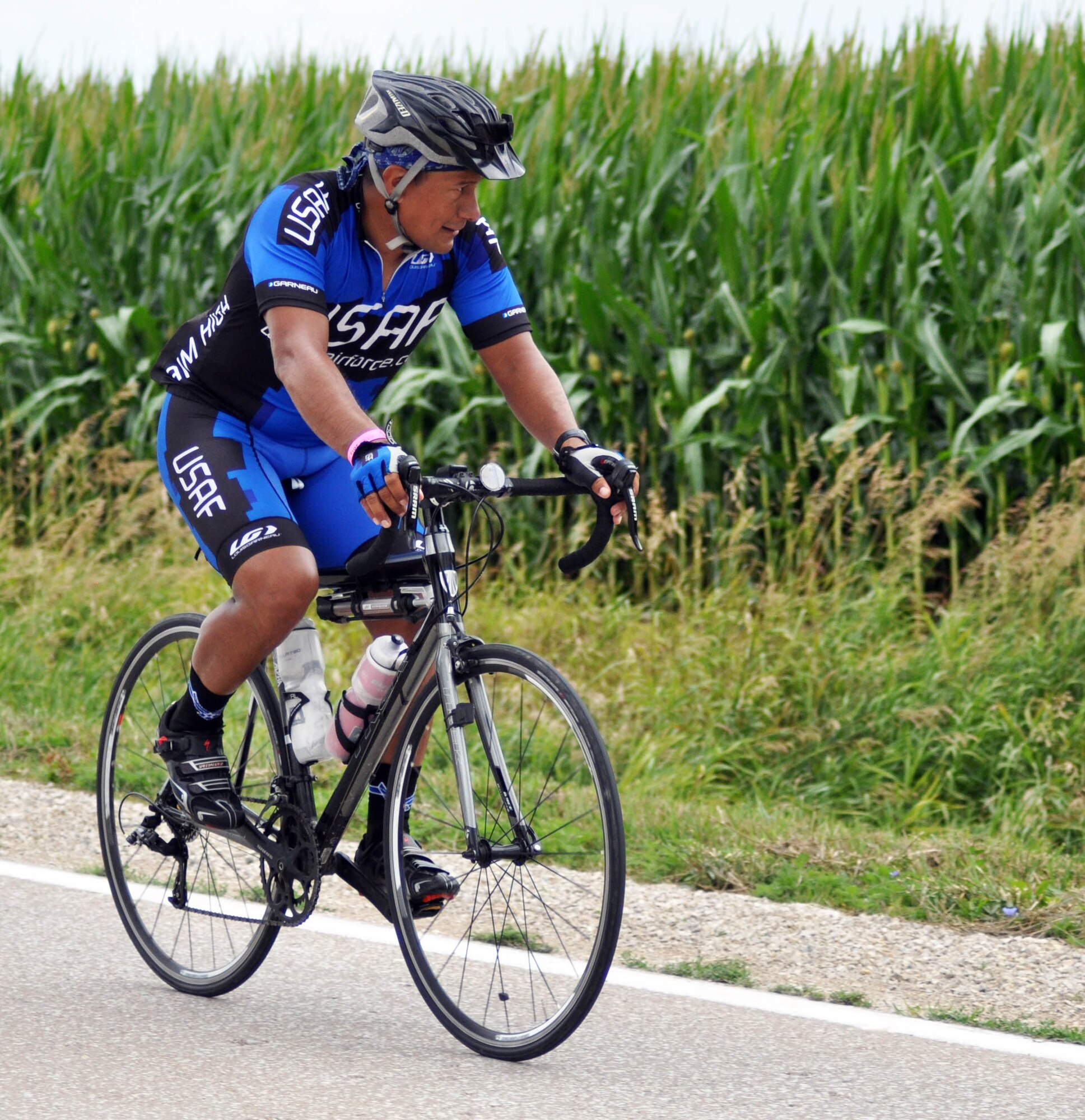 Master Sgt. Alejandro Jalven. 382nd TRS, Lackland AFB, rides through Packwood, Iowa, as part of the Air Force Cycling Team on the sixth day of the Register's Annual Great Bicycle Ride Across Iowa, July 26, 2013.  The AFCT is open to all Reserve, Guard, active duy and their families, as well as Air Force civilians and retirees.  (U.S. Air Force photo by Staff Sgt. Abigail Klein)
