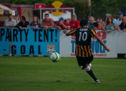 Jose Cuevas from the Charleston Battery, drives the ball downfield July 27, 2013, during Military Appreciation Night at Blackbaud Stadium, Daniel Island, S.C. The Charleston Battery hosted Military Appreciation Night to show their support for the local military community. (U.S. Air Force photo/Senior Airman Ashlee Galloway)